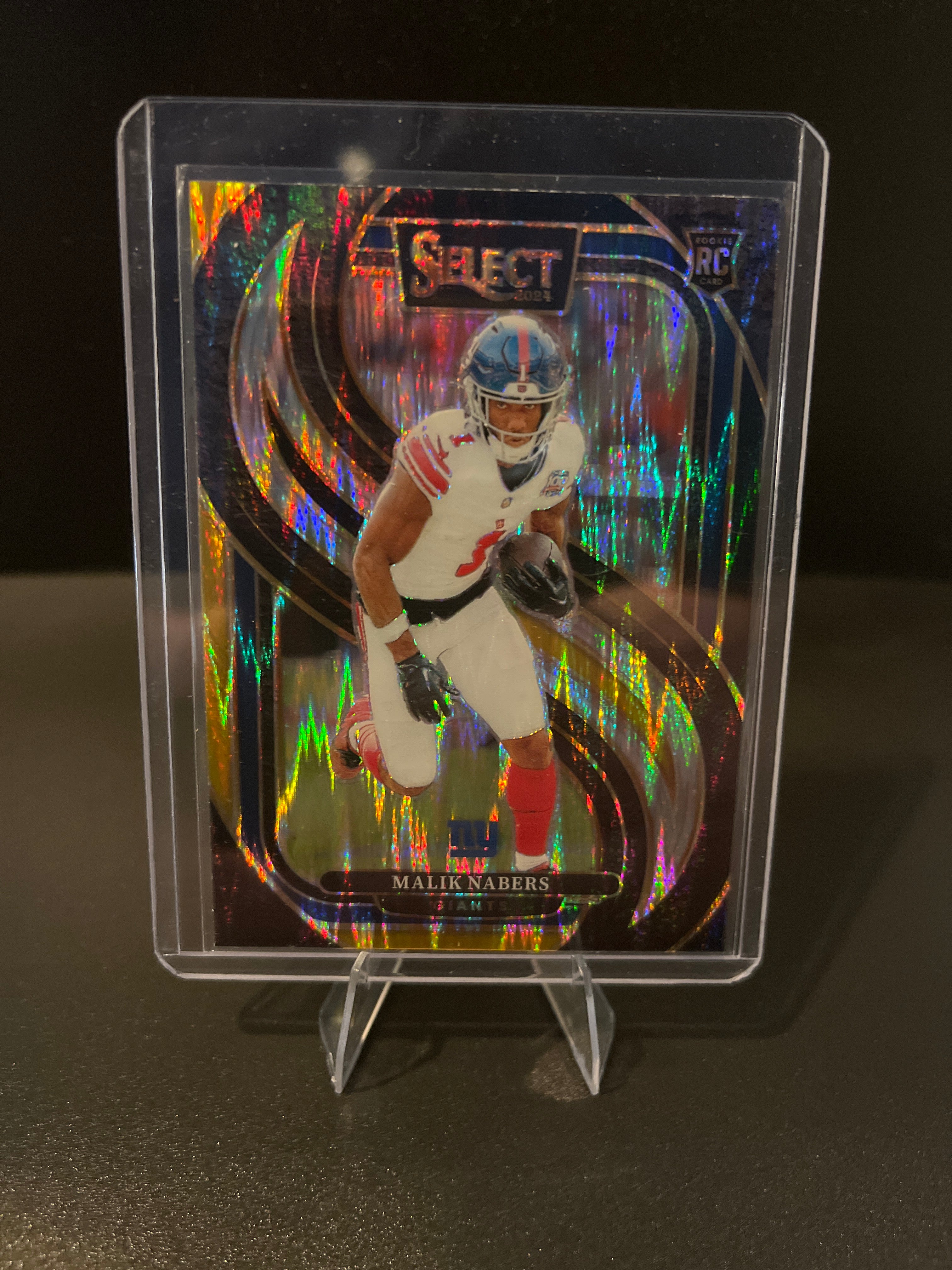 2024 Select Football Malik Nabers  (RC) Blue and Yellow Shock Prizm No. 116
