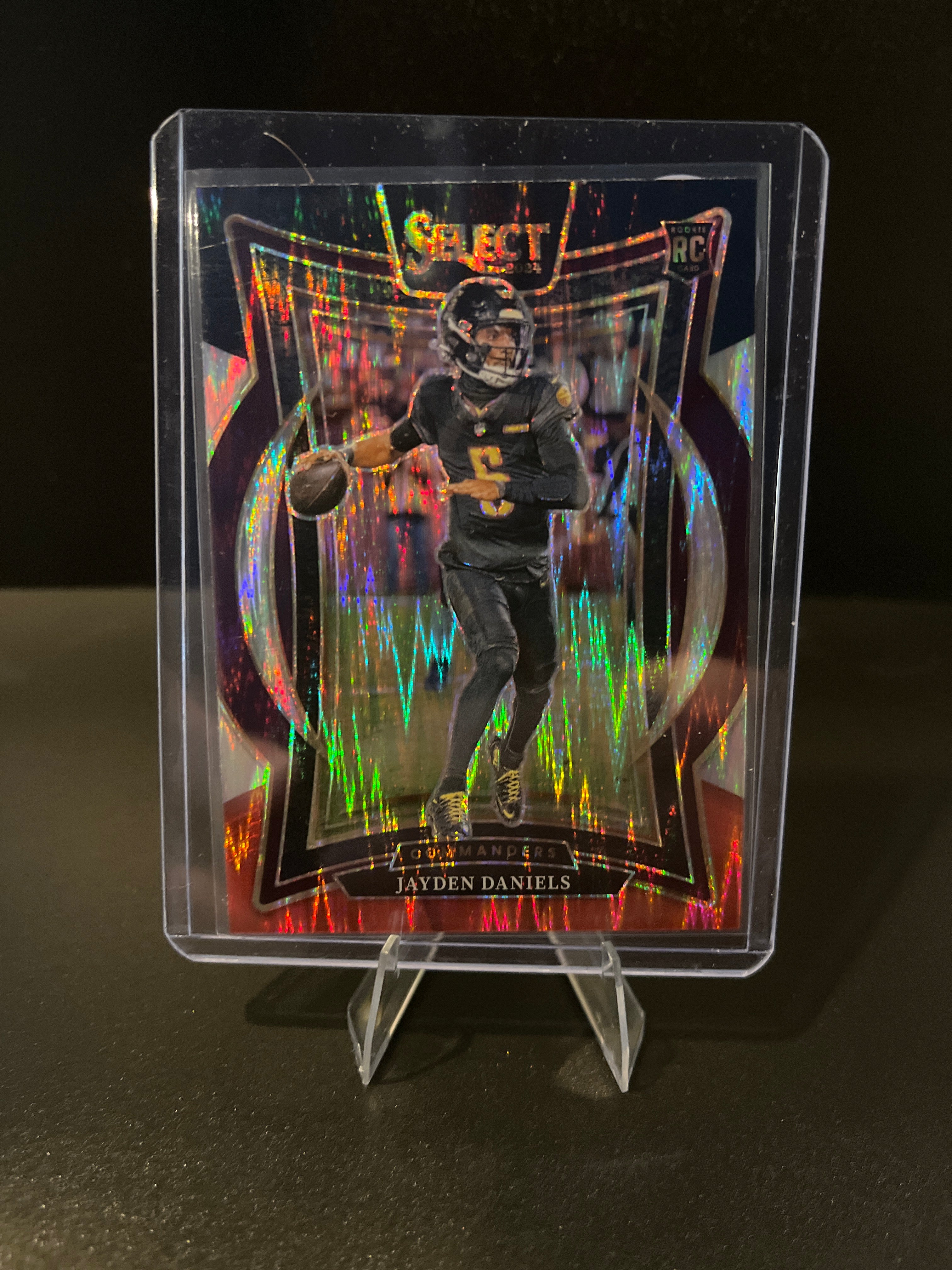 2024 Select Football Jayden Daniels (RC) Black and Ref Prizm Shock No. 26